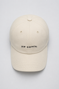 NO PANIC COFFEE beige cotton cap – front view